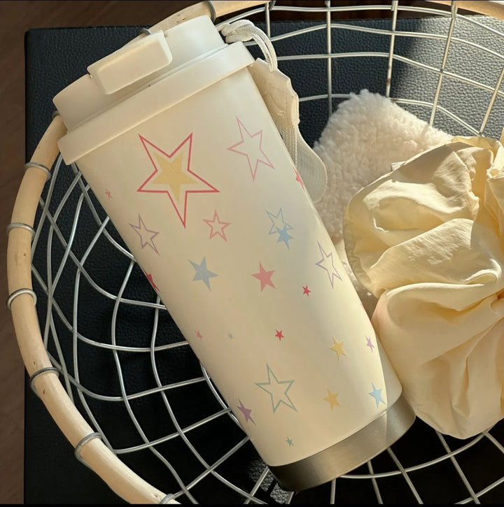 Women's insulated mug with practical carrying handle and charming Hello Kitty design Stornfield