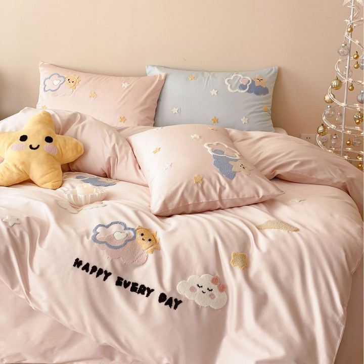 Children's duvet cover set with embroidered cloud and star appliqués