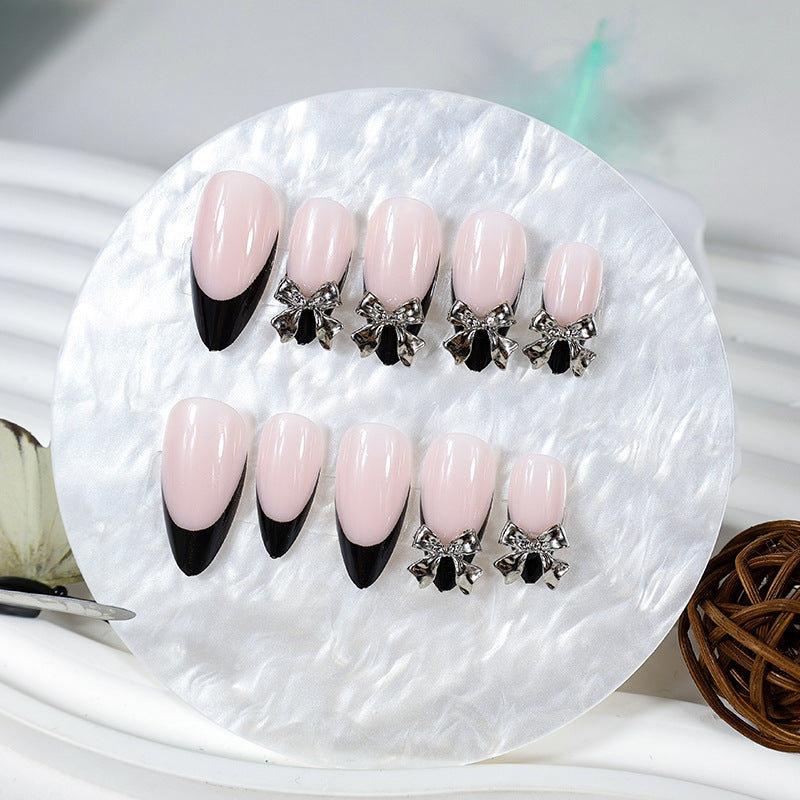 Nail art set with elegant tips and artistic embellishments Stornfield