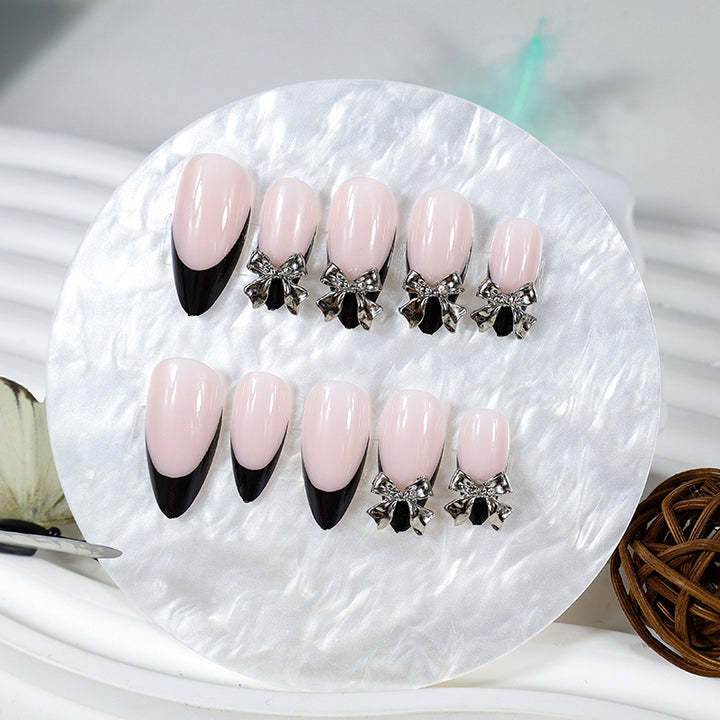 Nail art set with elegant tips and artistic embellishments Stornfield