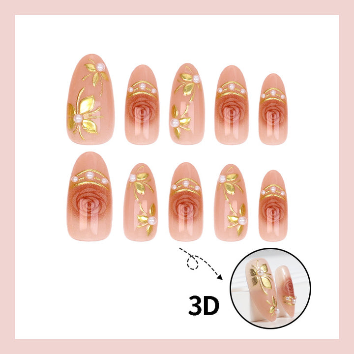 Artificial nail set with romantic rose designs and golden embellishments Stornfield