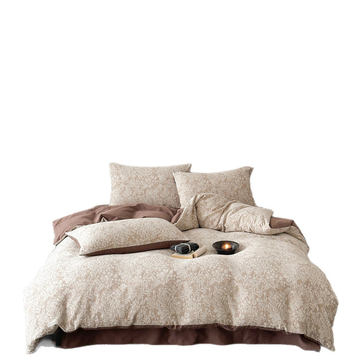 Reversible bedding set made of cotton blend with fine floral jacquard and contrasting solid reverse
