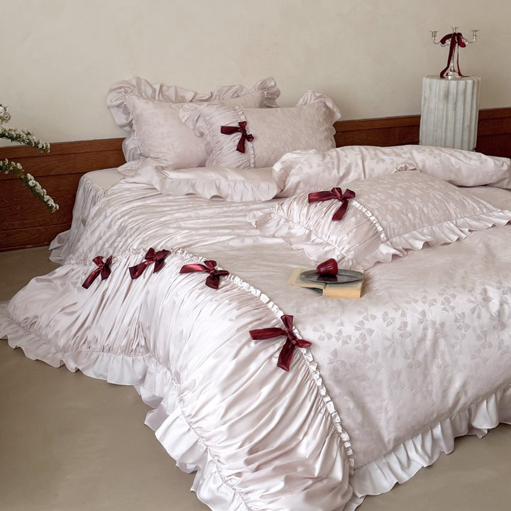 Satin bedding set with jacquard butterfly pattern, ruffle and decorative bows