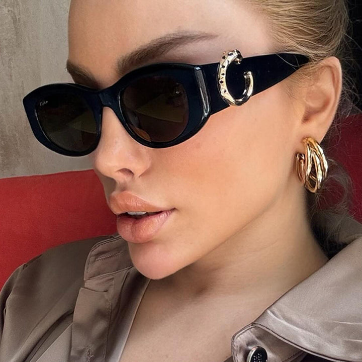 Women's elegant Cat-Eye sunglasses with golden details Stornfield