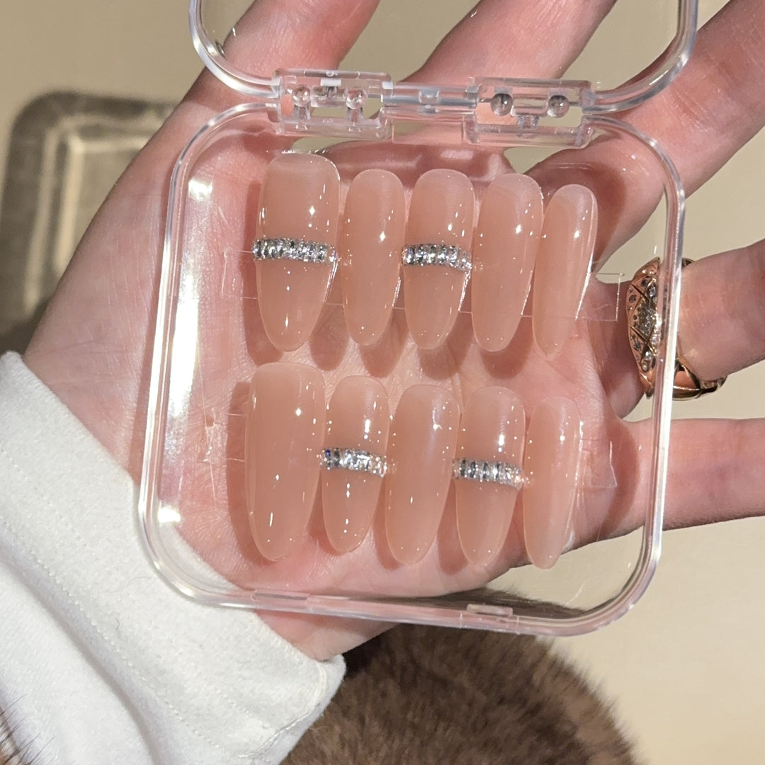 Glamorous artificial nails with rhinestones Stornfield