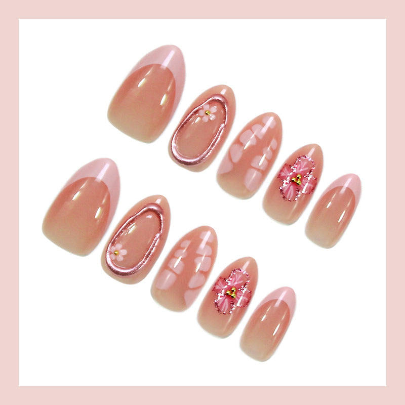 Artificial nail set with floral decorations and elegant accents Stornfield