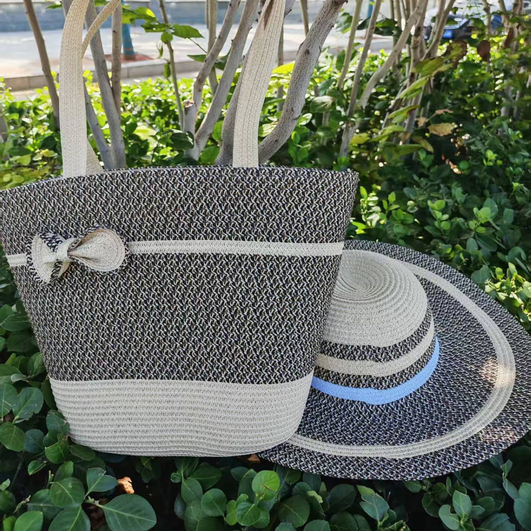 Elegant sun hat with wide brim and subtle stripe pattern Stornfield