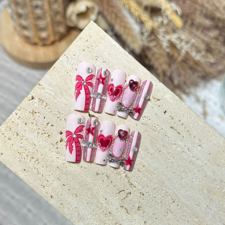 Artistic Press-On Nail Set with Playful Heart and Palm Designs Stornfield