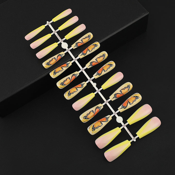 Art nails with butterfly motif Stornfield