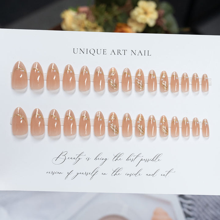Elegant French Tip Press-On Nails with Gold Accents