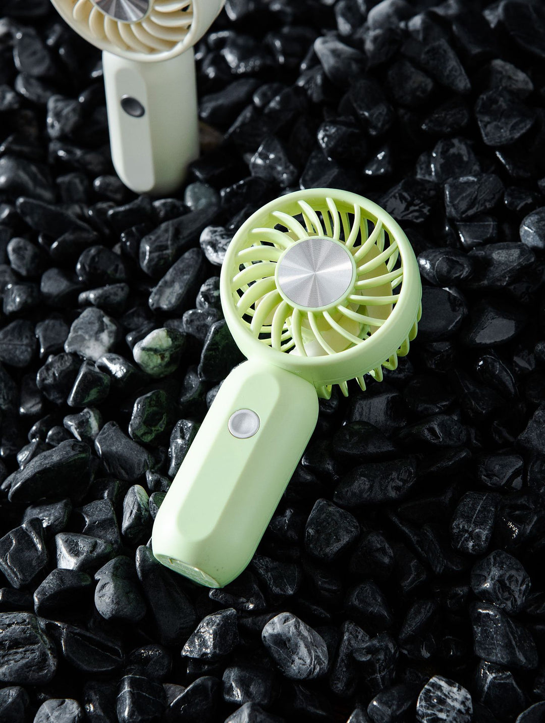 Women's portable mini fan with ergonomic grip technology Stornfield