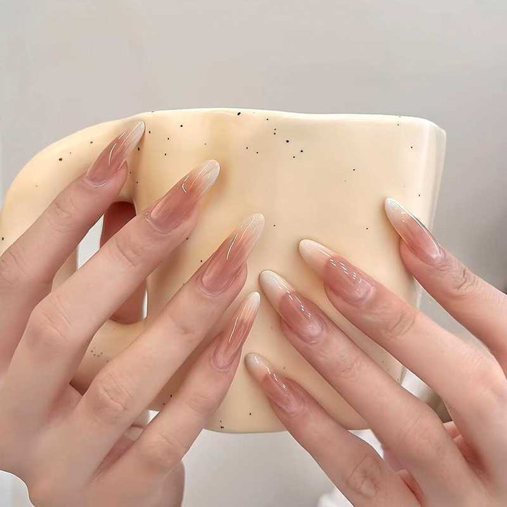 Artificial nails in the elegant French tip design Stornfield