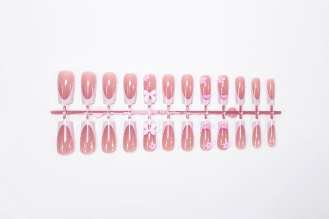 Artificial nail set with romantic flowers and elegant accents Stornfield