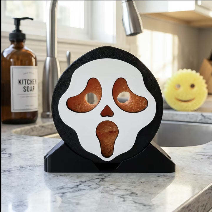 Freestanding sponge holder in skull design with storage compartment