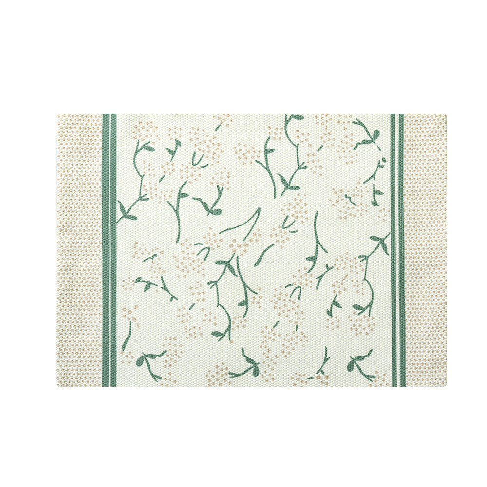 Floral woven bath mat with jacquard structure, absorbent cotton surface and non-slip underside Stornfield