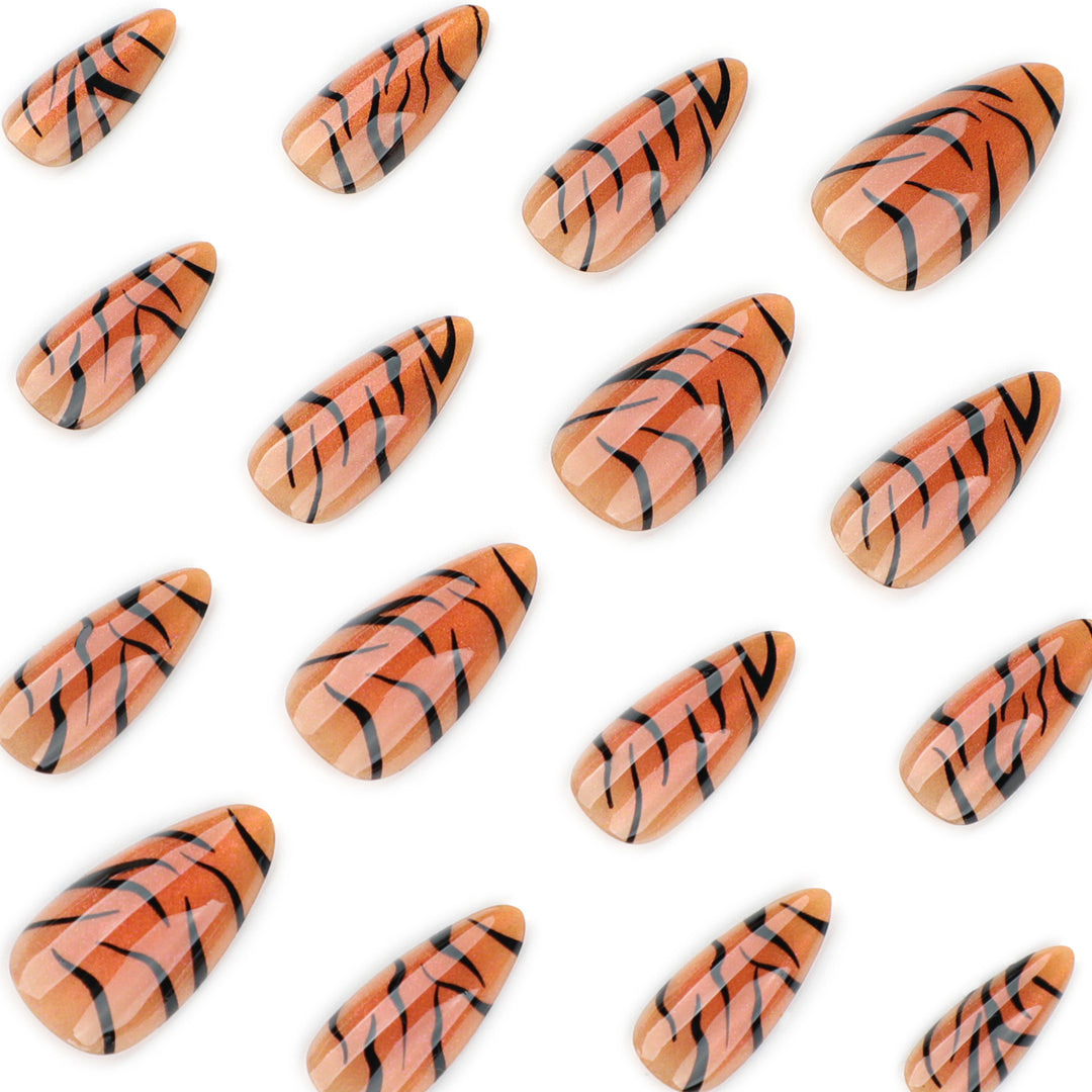 Artful stiletto nails with creative tiger stripe design Stornfield