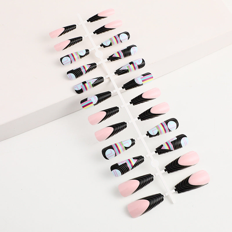 Creative artificial nails with modern graphic designs Stornfield