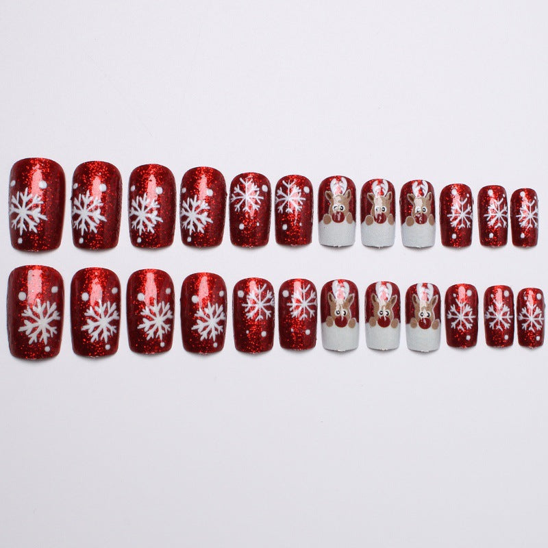Creative artificial nails with festive reindeer design Stornfield