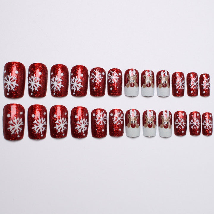 Creative artificial nails with festive reindeer design Stornfield