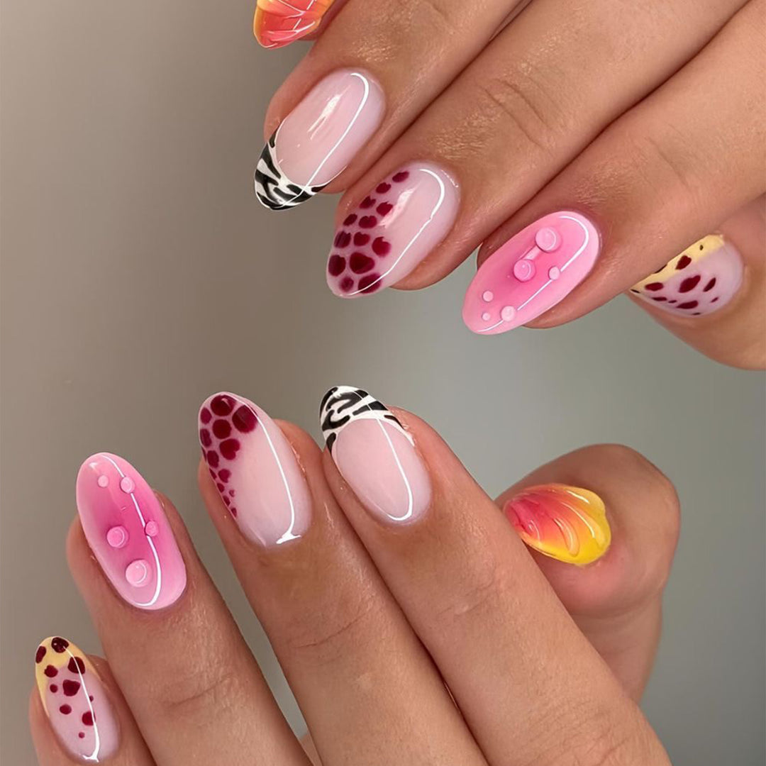 Creative artificial nails with floral design and glitter accents Stornfield