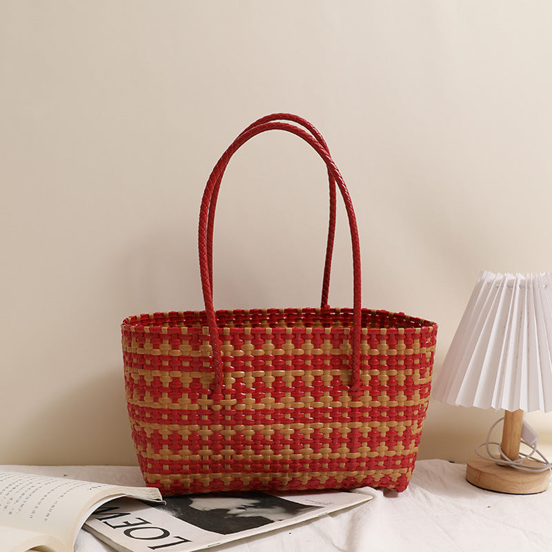Braided straw bag with color-contrasting stripes Stornfield