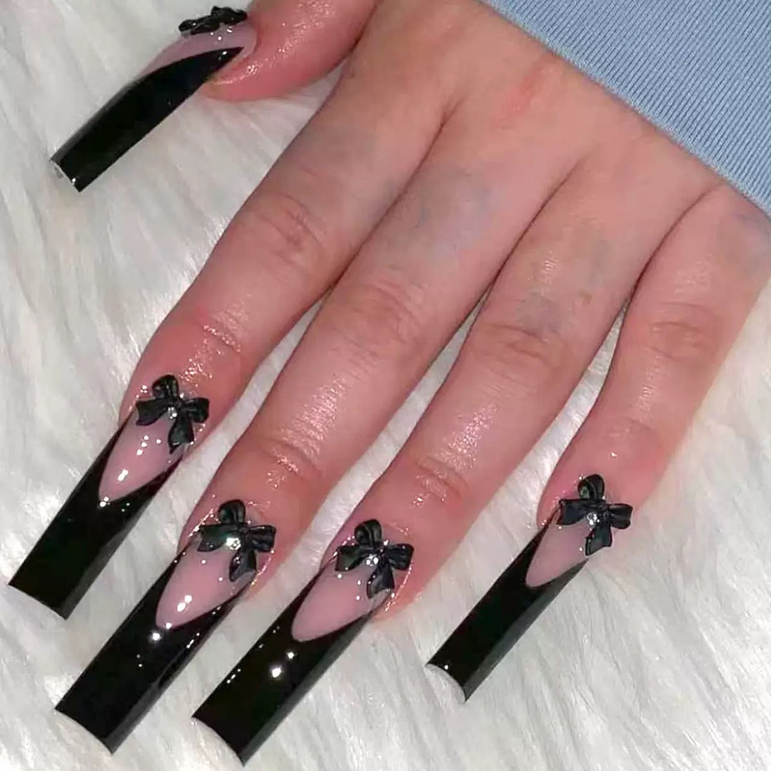 Elegant artificial nail tips with bow decorations Stornfield