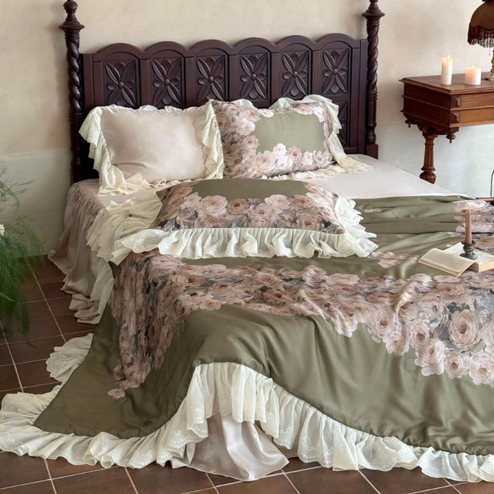 Vintage-inspired satin bedding with elaborate ruffled flounces and rose embroidery