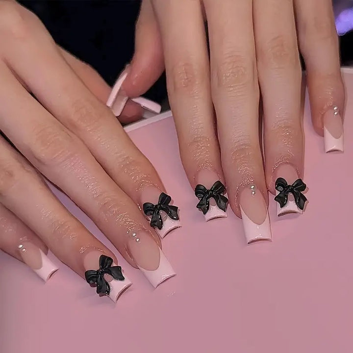 Stylish artificial nails with bow details Stornfield