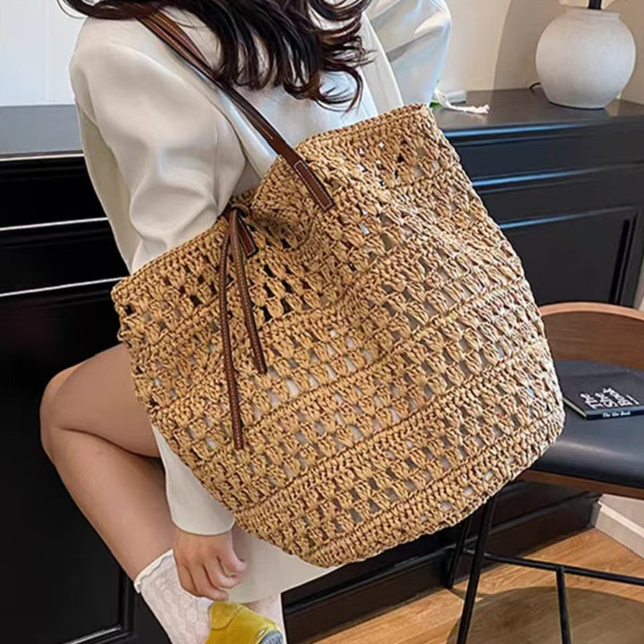 Woven natural material handbag with leather handles Stornfield