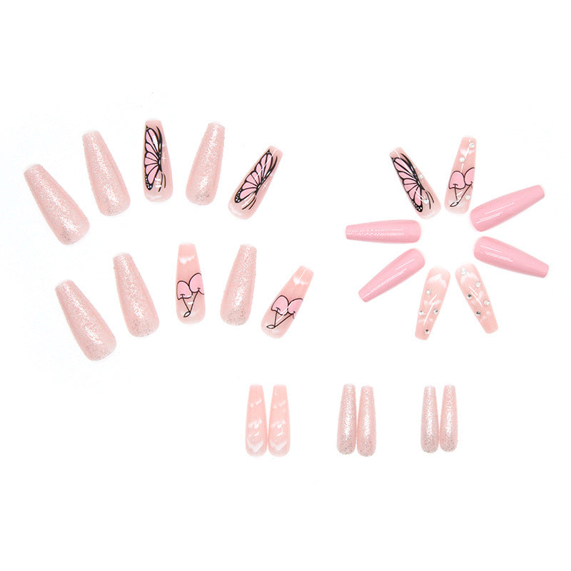Artificial nail set with romantic butterfly designs and glitter accents Stornfield