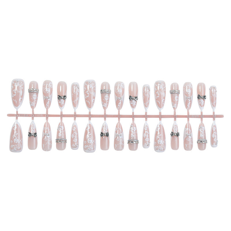 Artificial nail set with romantic floral design and sparkling accents Stornfield