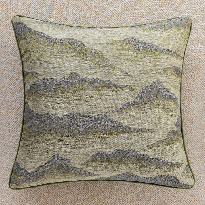 Elegant decorative pillow with elaborate mountain motif