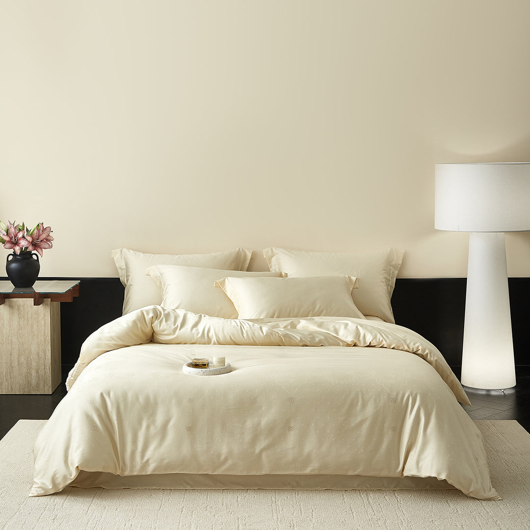 Satin bedding set with silky feel, hotel closure and tone-on-tone pattern