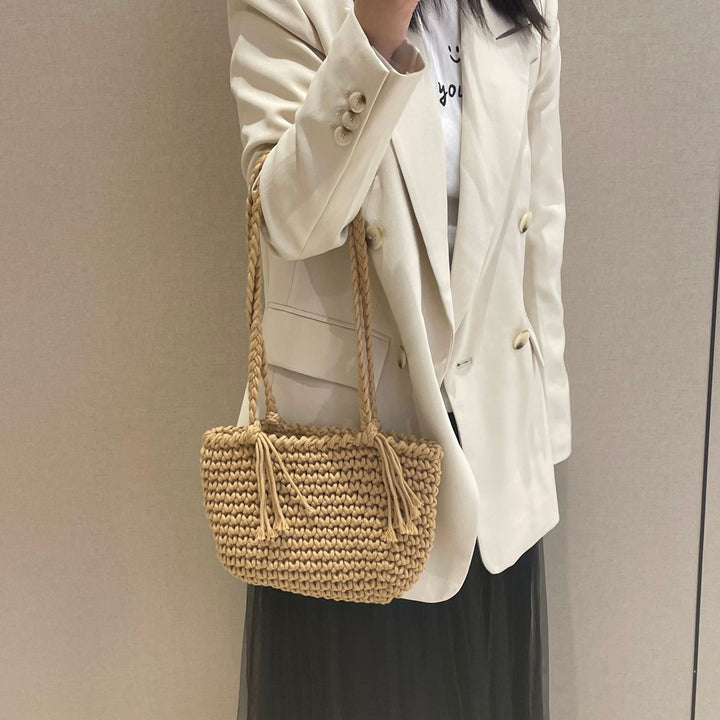 Hand-knotted shoulder bag with decorative pleating technique Stornfield