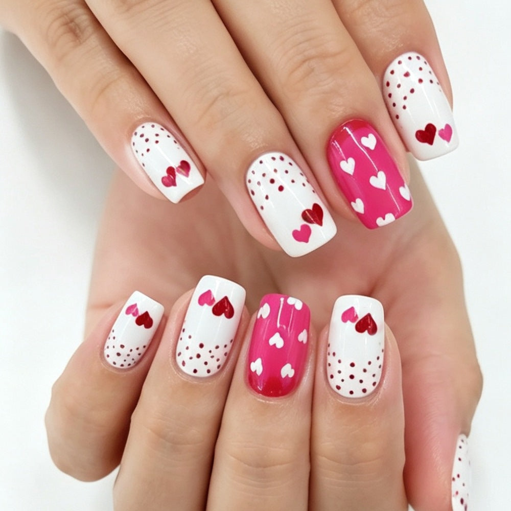 Artificial nails with romantic heart design and creative details Stornfield