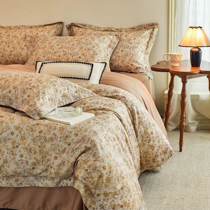 Luxurious cotton satin bed linen set with millefleurs floral pattern and fine piping