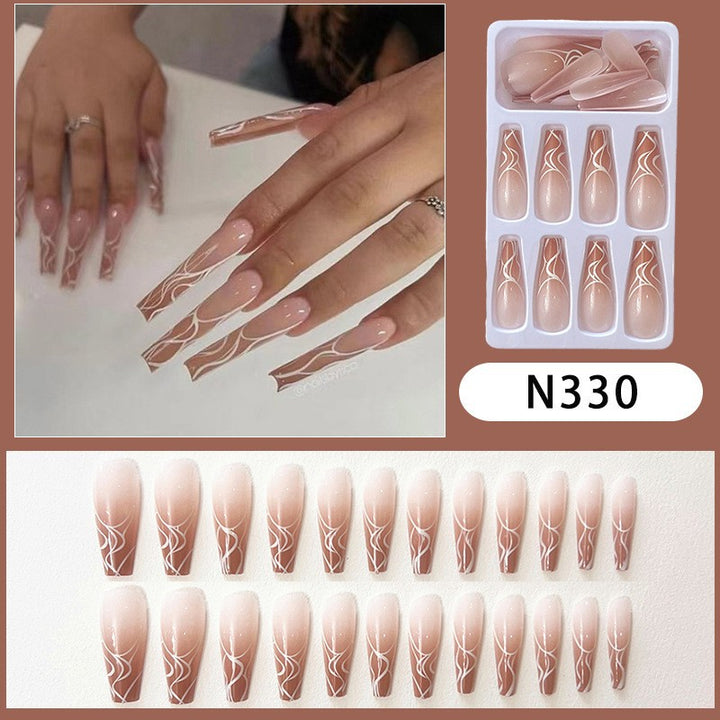 Stylish artificial nails with elegant patterns Stornfield