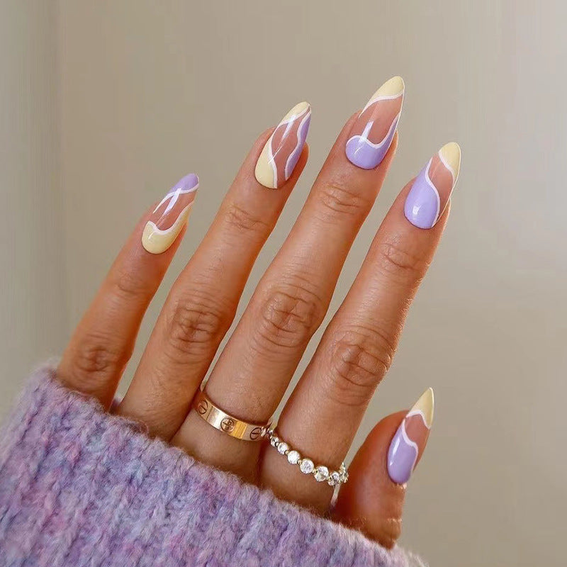 Artful Nail Extensions with Wave Design and Colorful Accents Stornfield