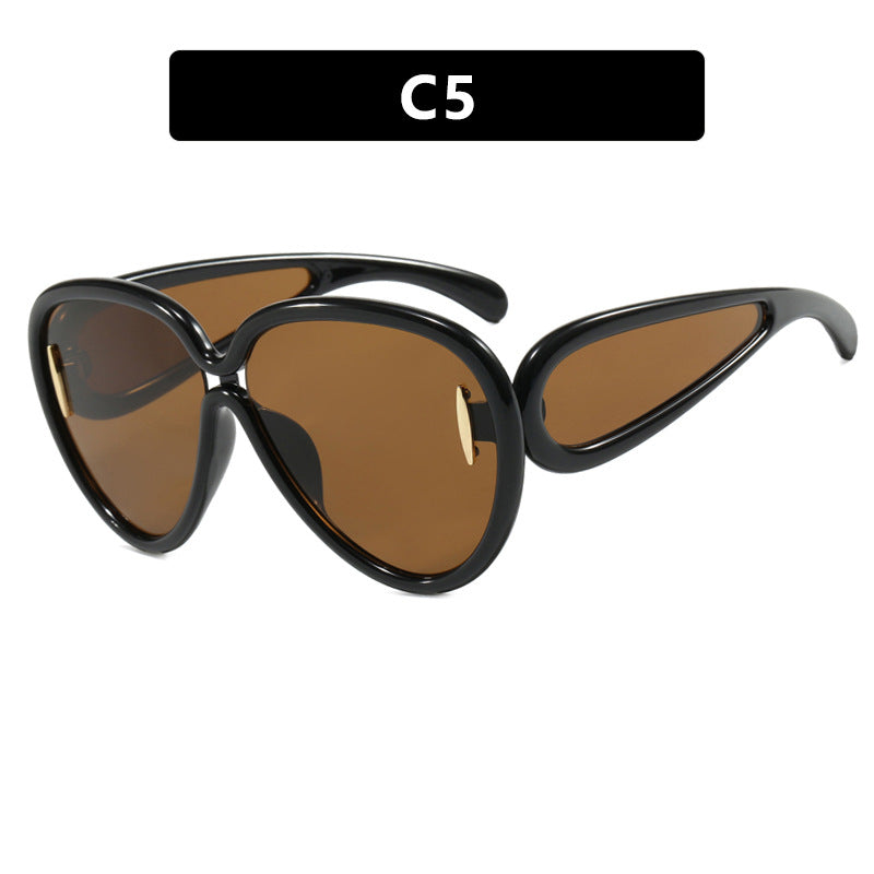 Women extravagant sunglasses in creative design Stornfield