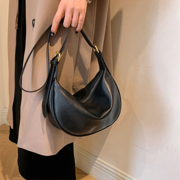 Sleek Crescent Shaped Crossbody Bag Stornfield