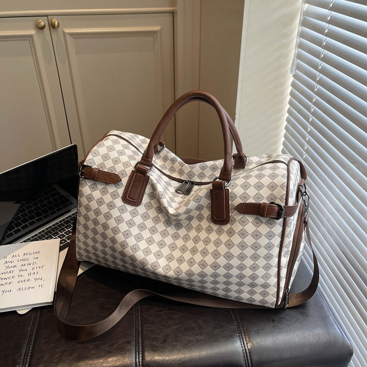 Sporty travel bag with multiple compartments and reinforced carrying handles Stornfield