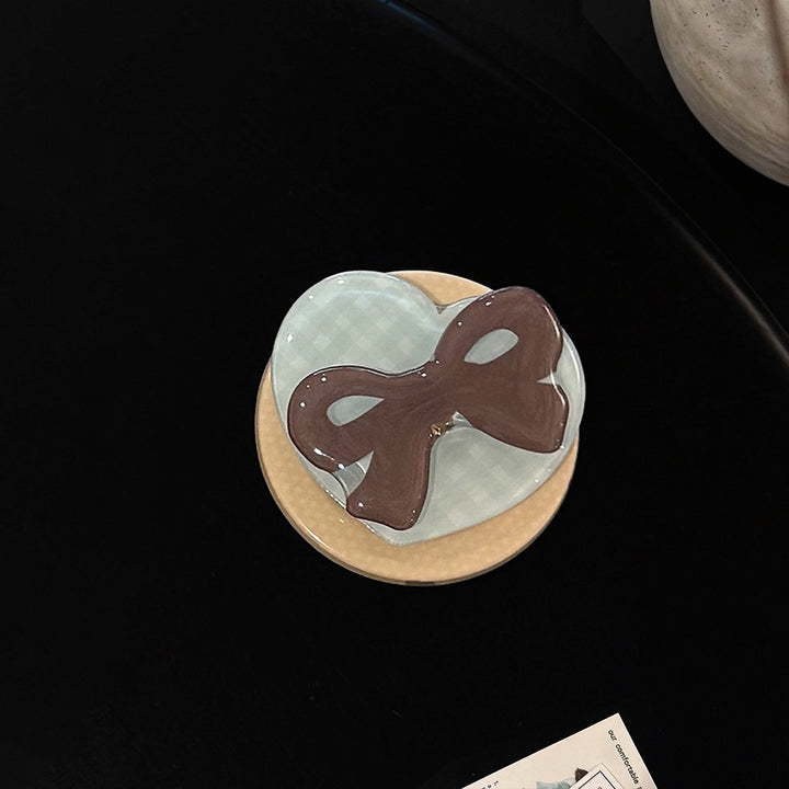 Decorative ceramic coaster with bow motif Stornfield