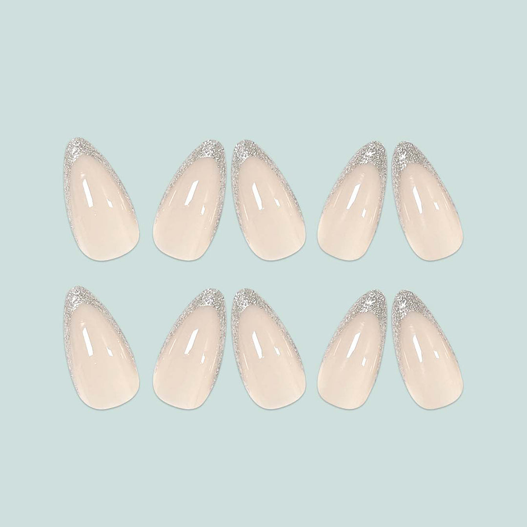 Glamorous stiletto artificial nails with glitter tips Stornfield