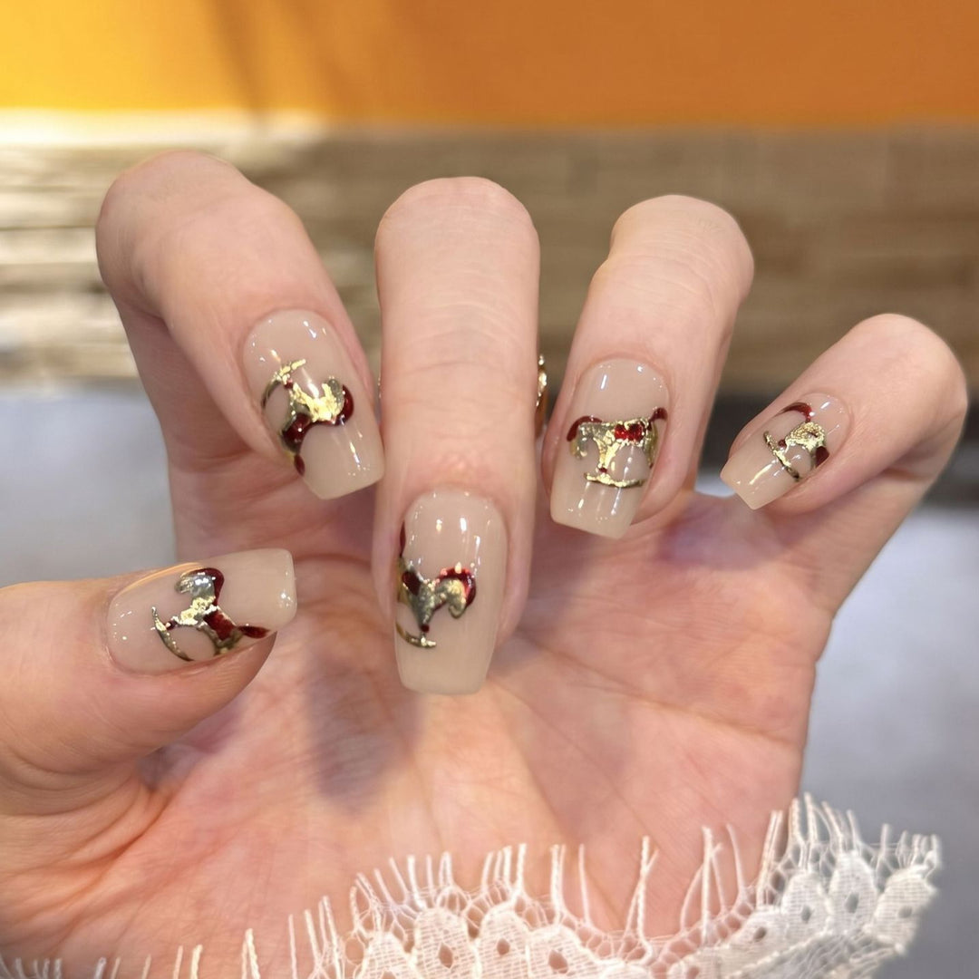 Decorative Press-On Nail Art Set with Gold Accent Designs Stornfield