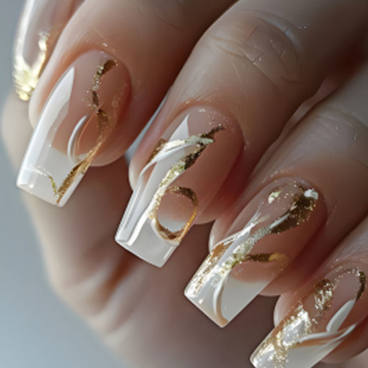 Artificial nails with elegant gold accents Stornfield