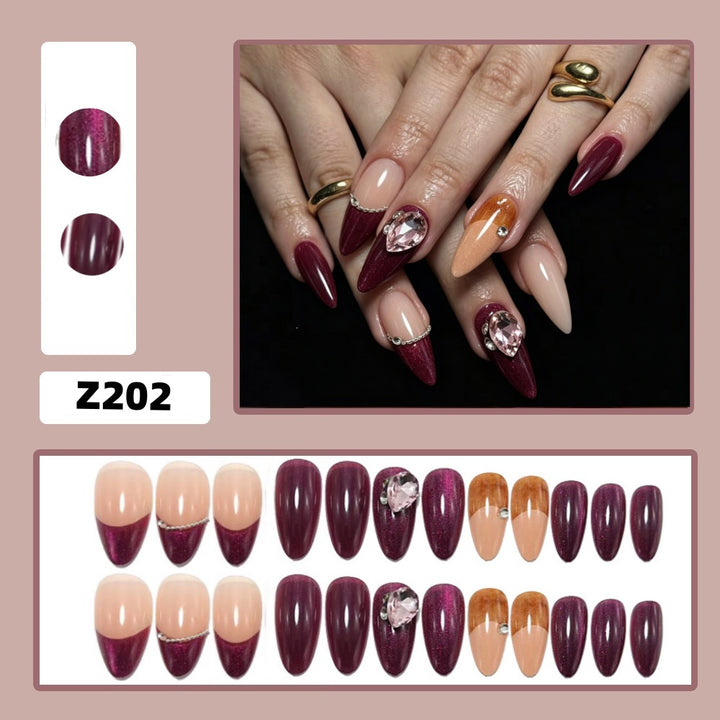 Artificial nails in elegant French design with glitter accents Stornfield