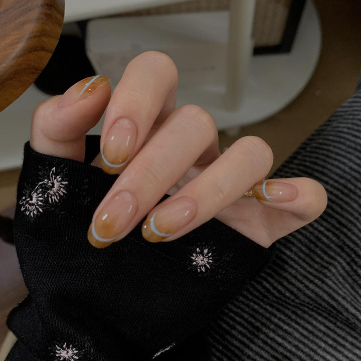 Artificial nails with modern French manicure design Stornfield