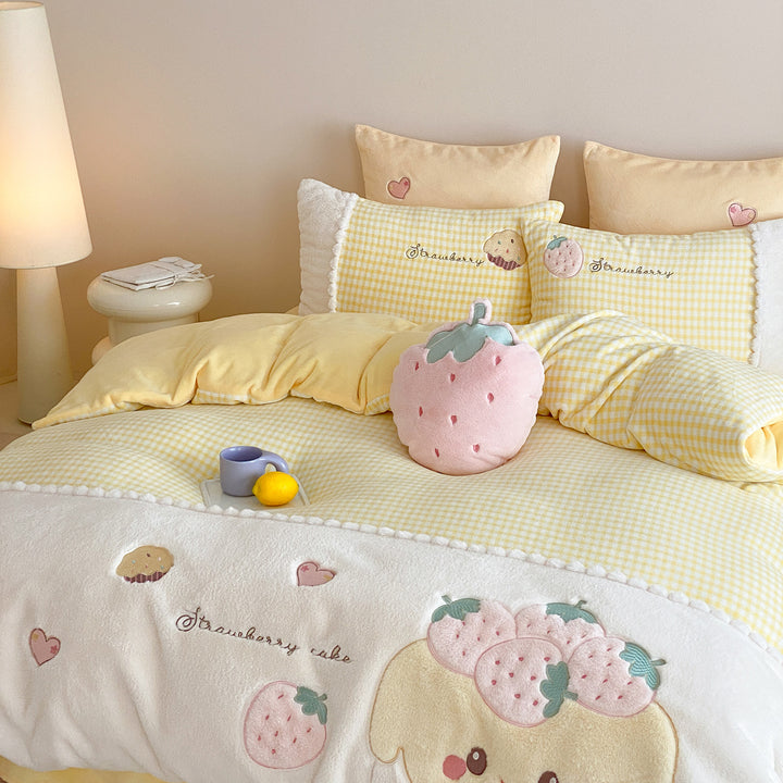 Cozy bedding set with embroidered strawberry appliqués