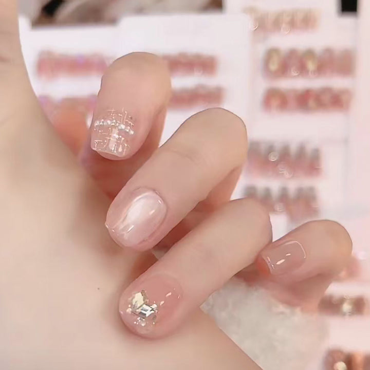 Elegant Press-On Nail Set with Pearl and Gold Accents