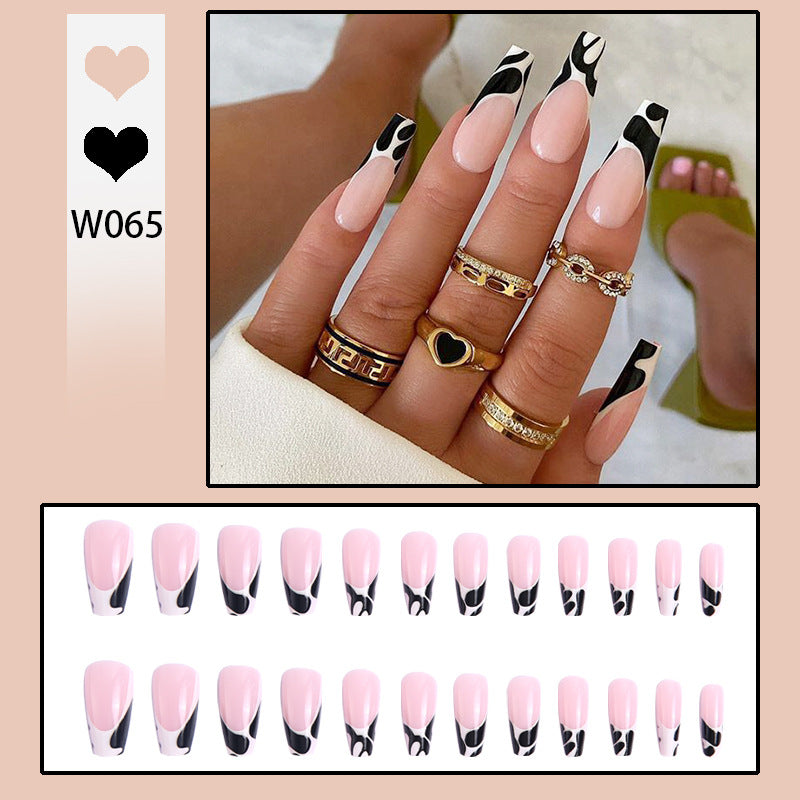 Exclusive artificial nails with elegant black and white patterns Stornfield